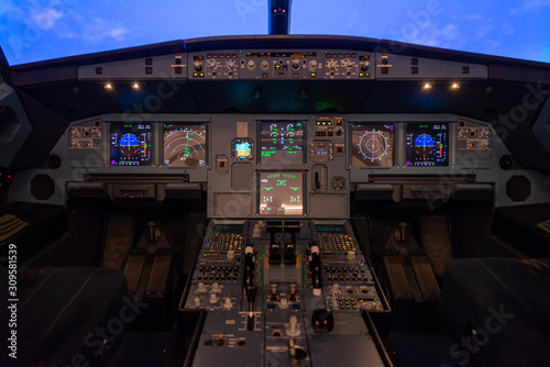 Fototapeta Naklejka Na Ścianę i Meble -  Airplane buttons in the cockpit simulator
