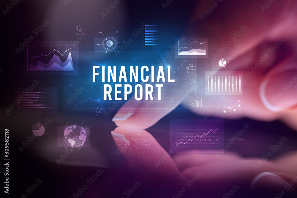 Finger touching tablet with charts and FINANCIAL REPORT inscription, business concept Finger touching tablet with charts and FINANCIAL REPORT inscription, business concept