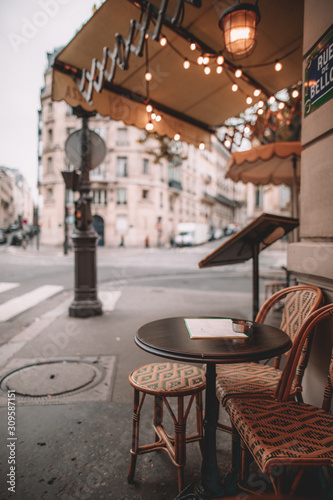 Canvas Print Coffee shop in paris france with string lights