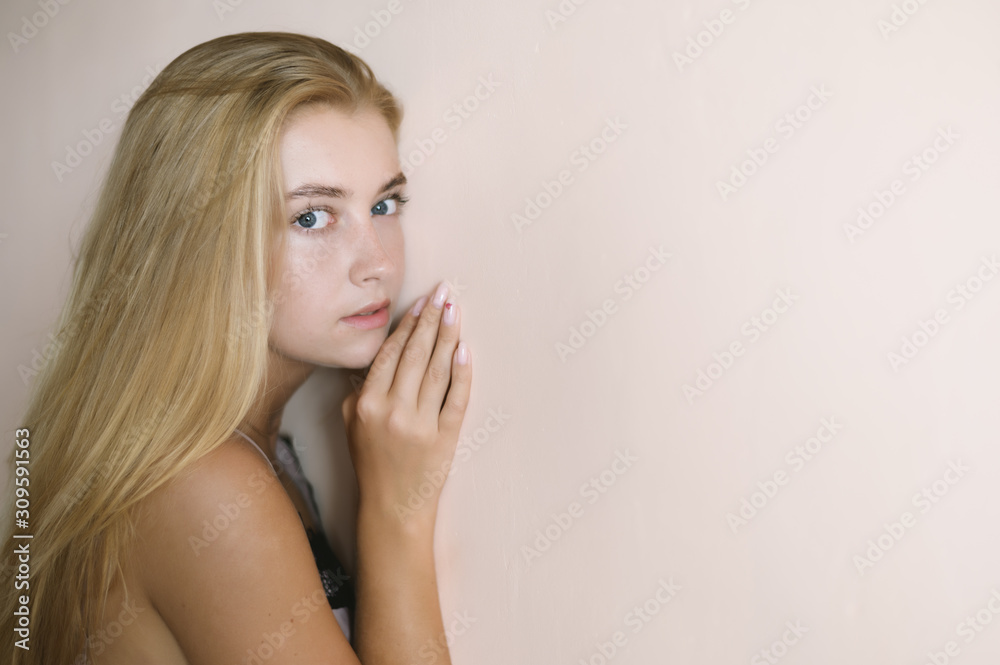 Portrait of beautiful sensual woman with blue eyes. Studio shot. Portrait of beautiful sensual woman with blue eyes. Studio shot.
