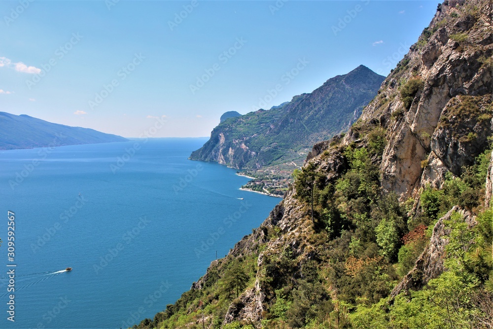View to Lake Garda. Hiking up to a mountain peak in Limone, Lago di Garda
