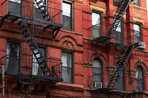 Canvas Print Colorful Old Brick Buildings in the East Village of New York City with Fire Esca