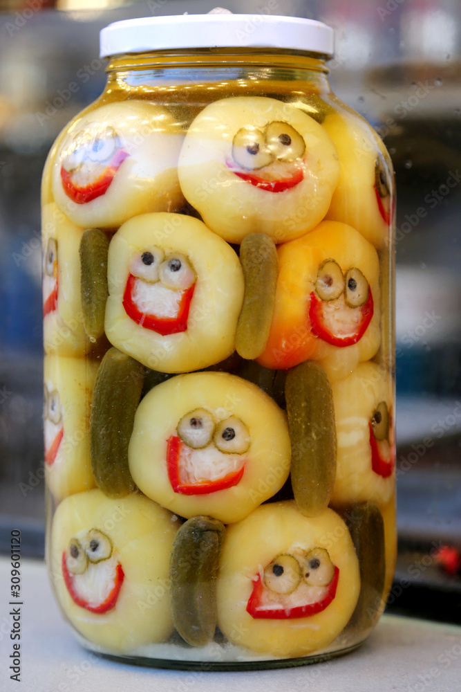 Funny jar of pickled vegetables in a hungarian christmas market as christmas present for sale