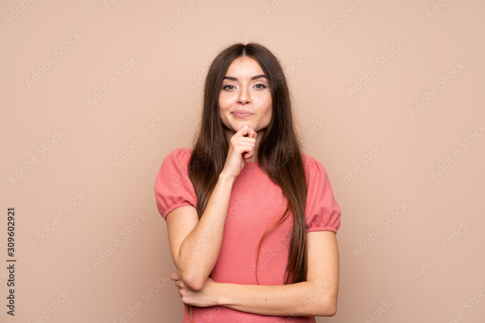 Young woman over isolated background laughing Young woman over isolated background laughing