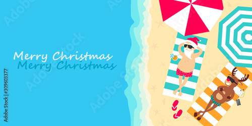 Christmas holiday. Santa Claus and deer Rudolph relax on the beach. Greeting Christmas card 2020