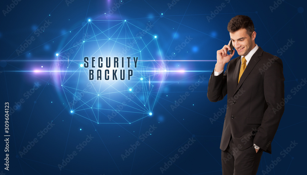 Businessman thinking about security solutions with SECURITY BACKUP inscription Businessman thinking about security solutions with SECURITY BACKUP inscription