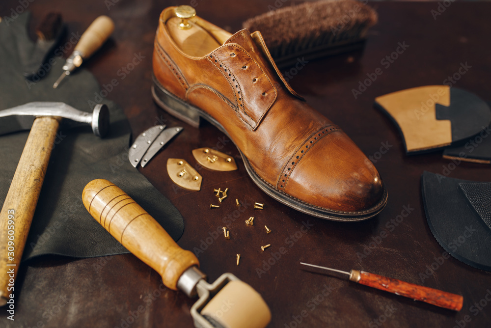 Shoemaker occupation, footwear repair equipment - obrazy, fototapety, plakaty 