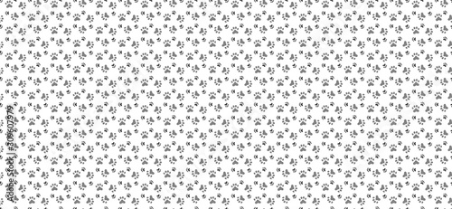 Pet paw print seamless pattern. Abstract animal vector background.