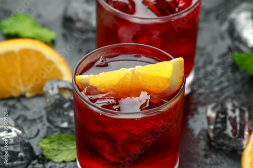 Classic Old Fashioned Negroni cocktail on rustic stone background