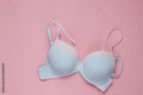 Two Stylish bra on a pink pastel background. Top view. Beauty and fashion minimalistic still life