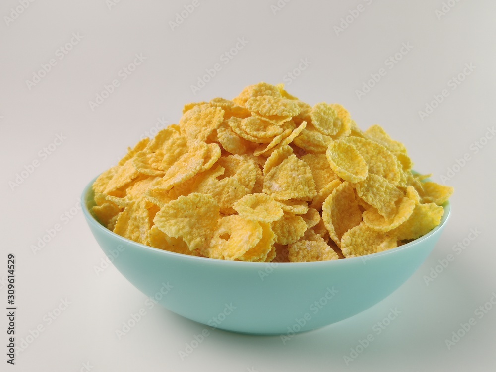 plate Full of delicious cereal in a blue bowl. healthy breakfast. plate Full of delicious cereal in a blue bowl. healthy breakfast.