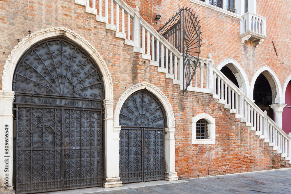 Detail of Gothic arches in Venetian architecture at Rialto Market, Venice, Veneto, Italy