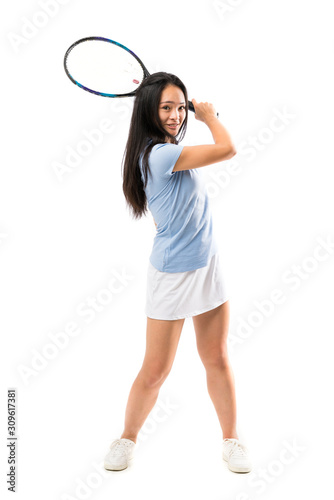 Young asian tennis player over isolated white background
