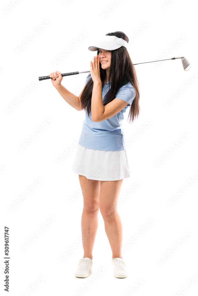 Young asian golfer girl over isolated white background whispering something Young asian golfer girl over isolated white background whispering something