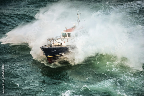 incredible view of a pilot boat in the storm