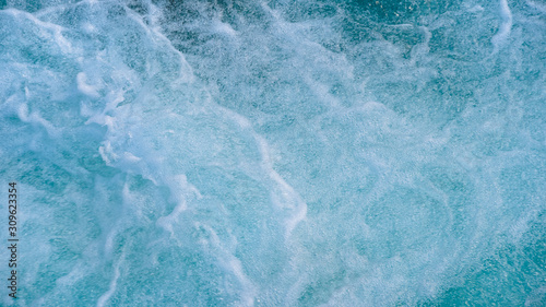 Turquoise color of river water. Blue sea, ocean for with waves