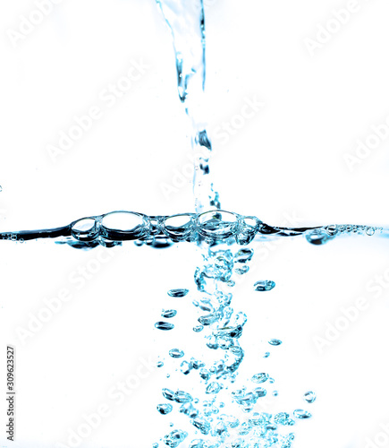 Water and air bubbles over white background