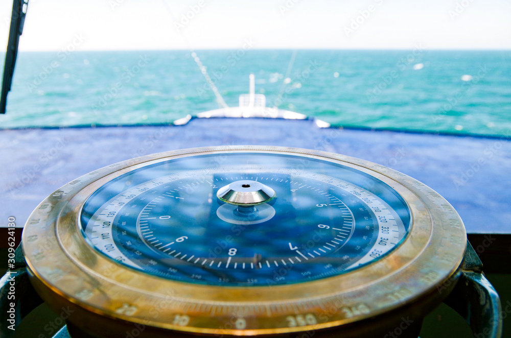 Bridge of classic cruise ship with nautical and technical appliances and  equipment including binoculars, cameras and compass Stock Photo