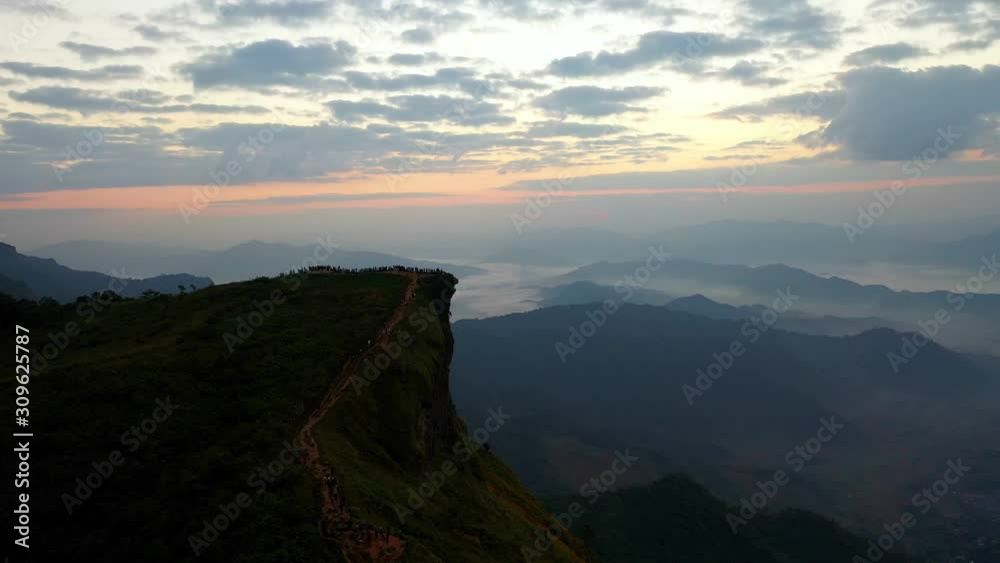Aerial view of tourists' silhouettes and photographers taking pictures