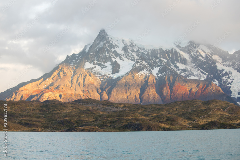 First light of dawn in the landscape of the Torres del Paine mountains in autumn, Torres del Paine National Park, Chile