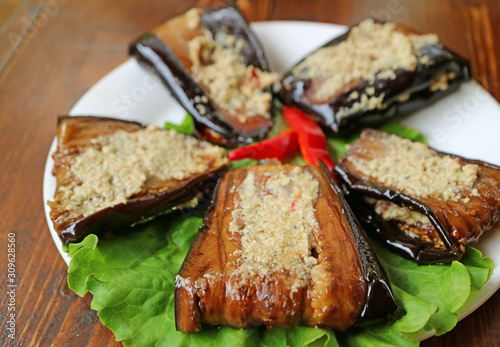 Closeup Tasty Fried Eggplant Roll with Garlic Walnut Paste or Badrijani Nigvzit photo