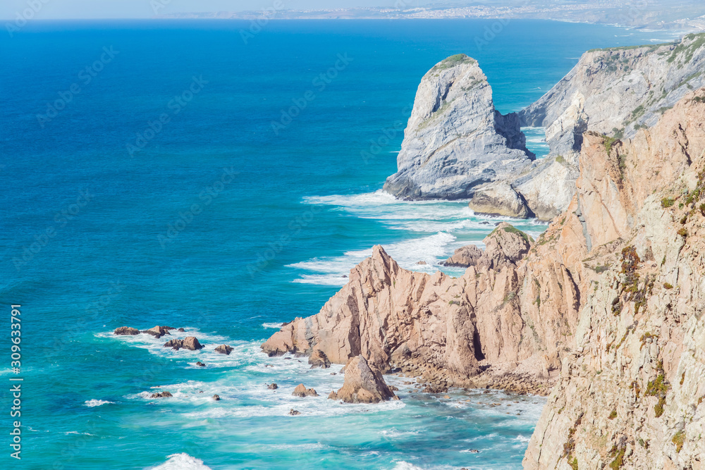 Cliffs over the Atlantic ocean. The westernmost point in Europe. The edge of the land. Cape Roca (Cabo da Roca), Portugal