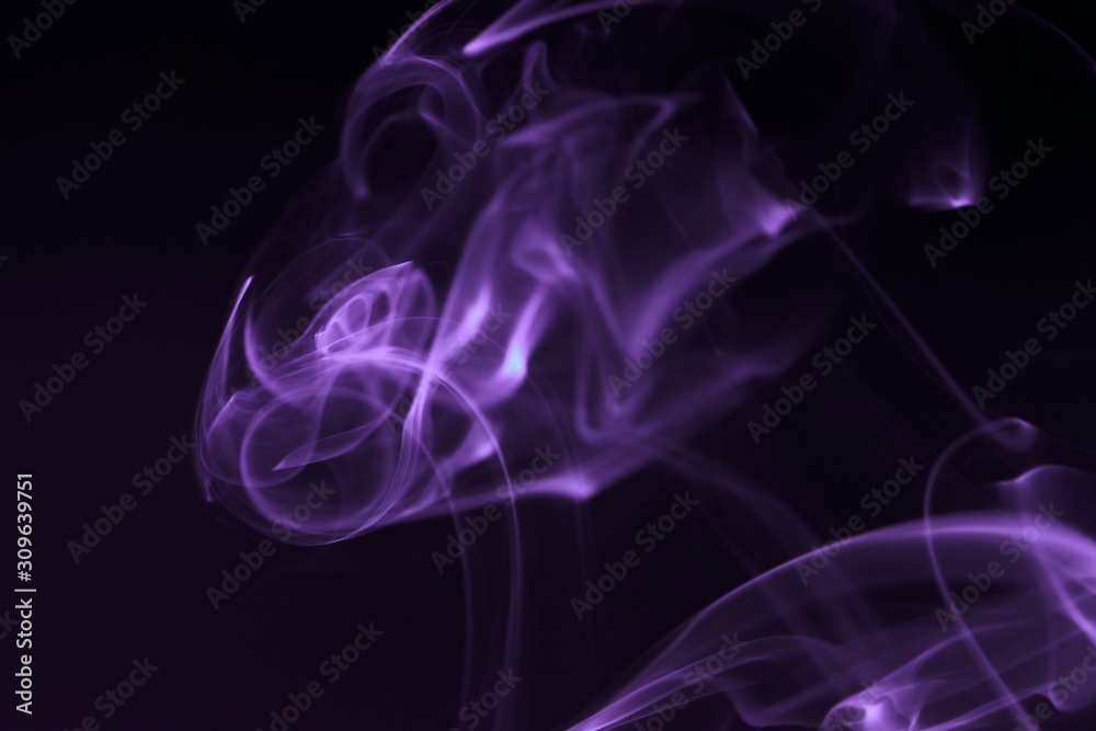 Mystic smoke patterns moving in colour on black background. Mystic smoke patterns moving in colour on black background.