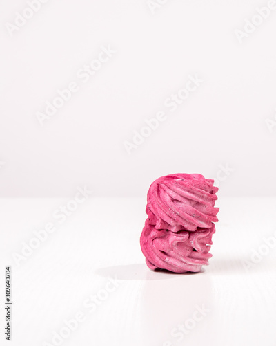 Handmade air russian fruit pink marshmallow on a white background. Homemade Sweets.