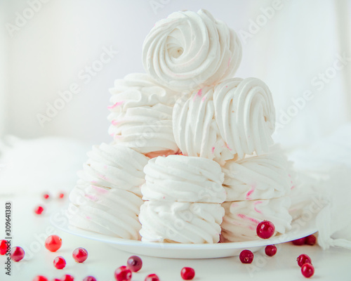 Handmade air russian fruit white marshmallow on a white background. Homemade Sweets.