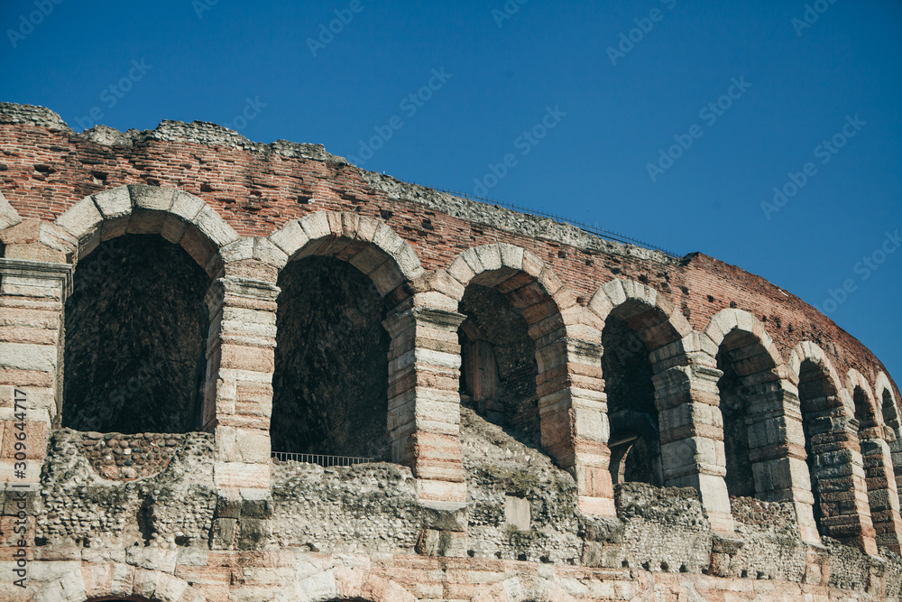 Closeup part of the wall of the ancient Roman Colosseum or Arena in Verona in Italy.