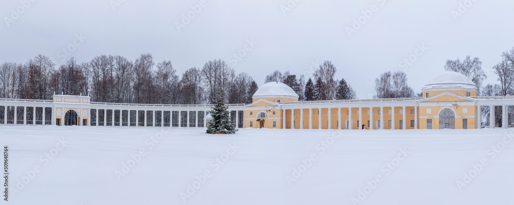 Panorama of the old manor Znamenka-Raek. The landscape is very snowy. Raek Village, Tver Oblast, Russia.