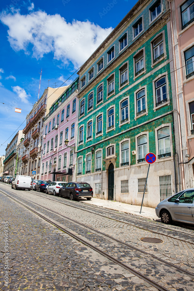 Traditional architecture of the facades covered with ceramic tiles called azulejos in the city of Lisbon in Portugal
