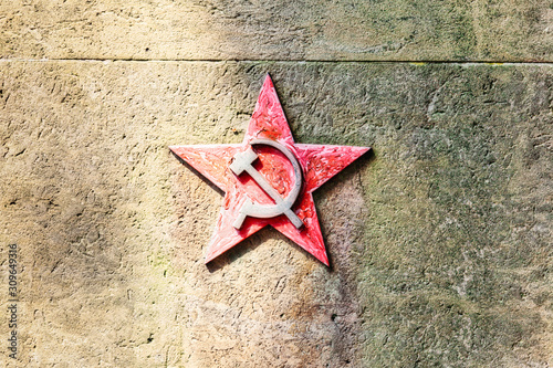 Old soviet symbol on the wall. Germany