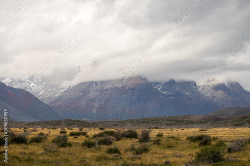 The Torres del Paine mountains in the clouds in autumn, Torres del Paine National Park, Chile