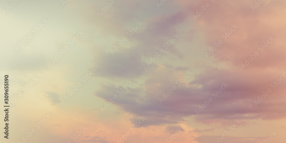 Sunset sky with pastel clouds background.