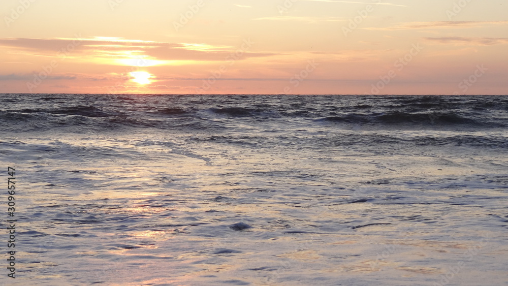 Sunset on the German North Sea beach in summer Sunset on the German North Sea beach in summer