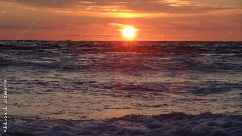 Sunset on the German North Sea beach in summer Sunset on the German North Sea beach in summer