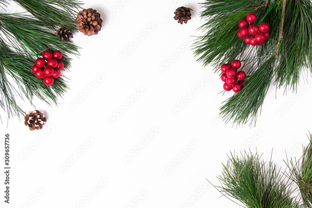 Christmas background with fir and santa hat on white background. Flat lay. Mockup. Christmas background with fir and santa hat on white background. Flat lay. Mockup.