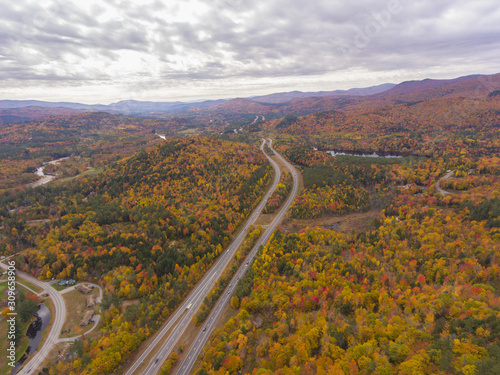 Interstate Highway 93 at Exit 30 with US Route 3 and Pemigewasset River in White Mountain National Forest aerial view with fall foliage, Town of Thornton, New Hampshire NH, USA. © Wangkun Jia