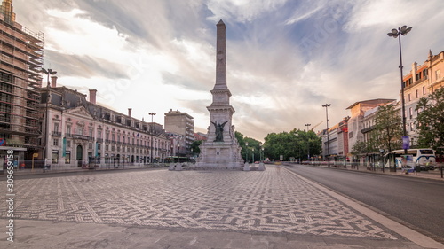 Monument to the Restorers timelapse hyperlapse at Restauradores Square Lisbon, Portugal photo