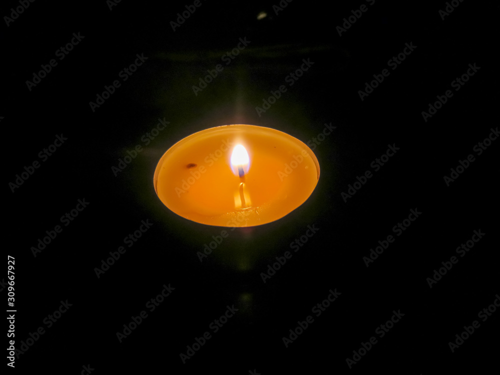 Fototapeta premium candle in the dark