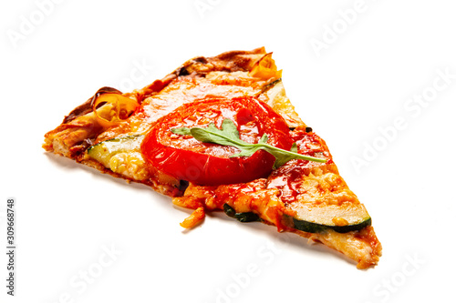 Sliced margherita pizza on white background