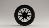 Matte Black Alloy Rim Wheel with a Complex 14 Spoke Offset Open Wheel Design with Racing Tyre 3d illustration 3d render