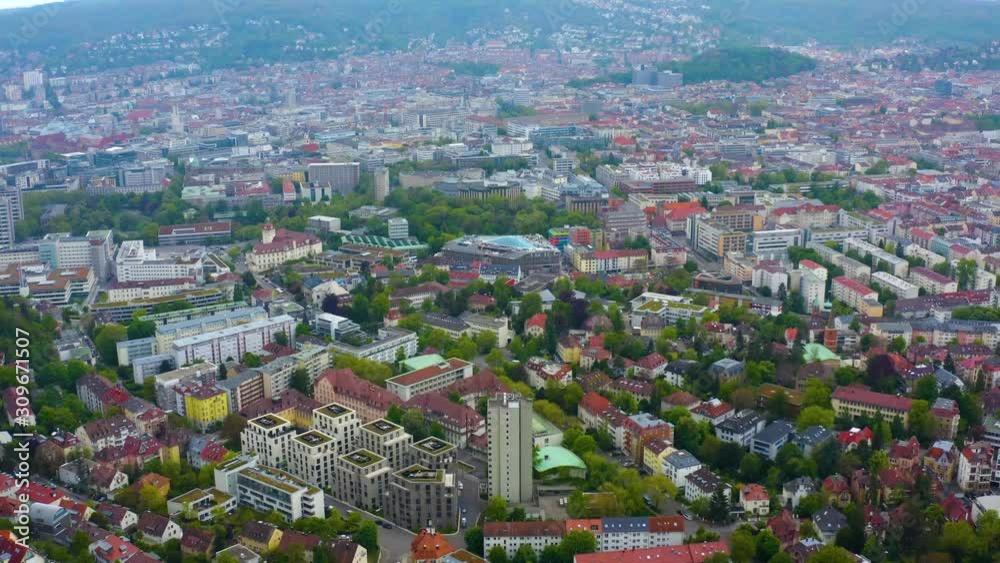 Aerial around the Bismarck tower in spring in Stuttgart, Germany. Round pan to the right across downtown Stuttgart. Aerial around the Bismarck tower in spring in Stuttgart, Germany. Round pan to the right across downtown Stuttgart.
