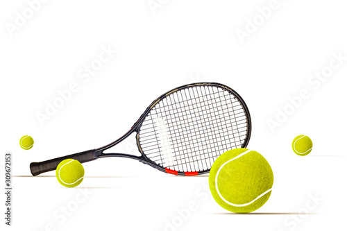 Tennis balls and racquet isolated the white background © Angelov