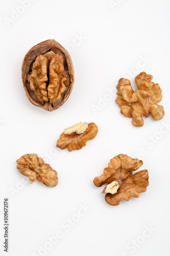 Walnuts isolated on white backgroun from top view.