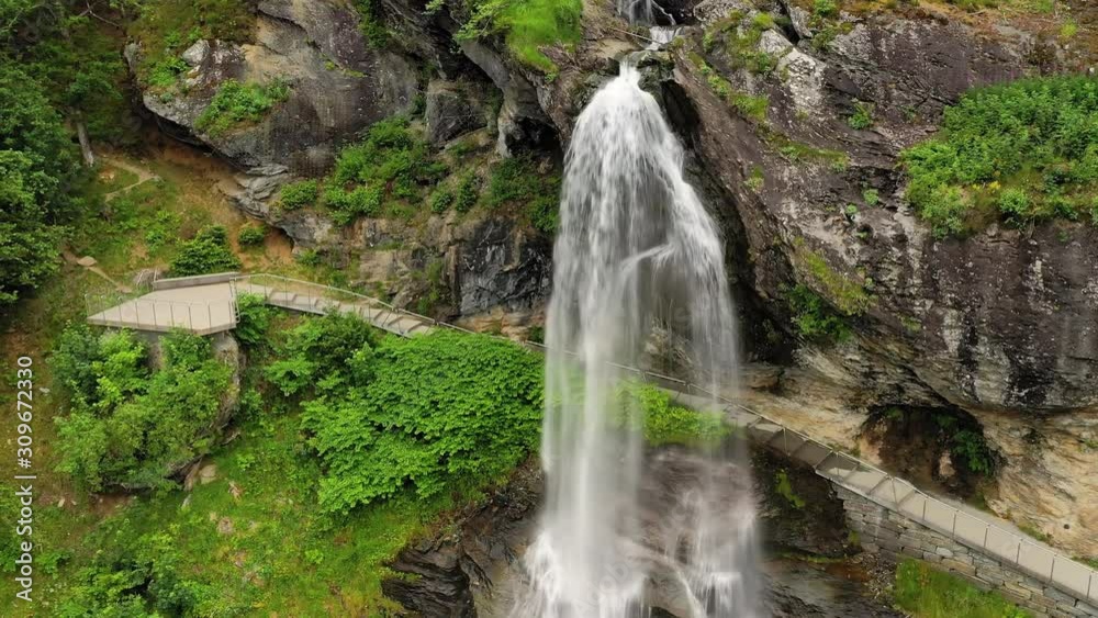 Steinsdalsfossen is a waterfall in the village of Steine in the municipality of Kvam in Hordaland county, Norway. The waterfall is one of the most visited tourist sites in Norway. Steinsdalsfossen is a waterfall in the village of Steine in the municipality of Kvam in Hordaland county, Norway. The waterfall is one of the most visited tourist sites in Norway.