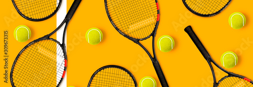 Tennis racket balls on yellow background © Angelov
