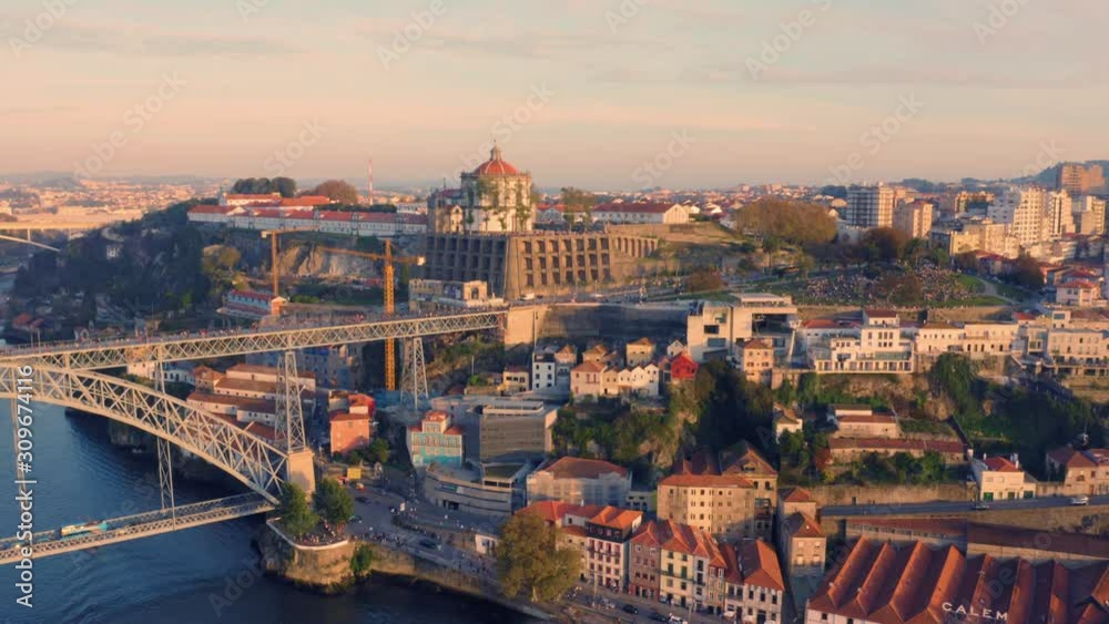 Porto, Portugal. Aerial view of the old city with Monastery of Serra do Pilar and Dom Luís I Bridge at sunset Porto, Portugal. Aerial view of the old city with Monastery of Serra do Pilar and Dom Luís I Bridge at sunset