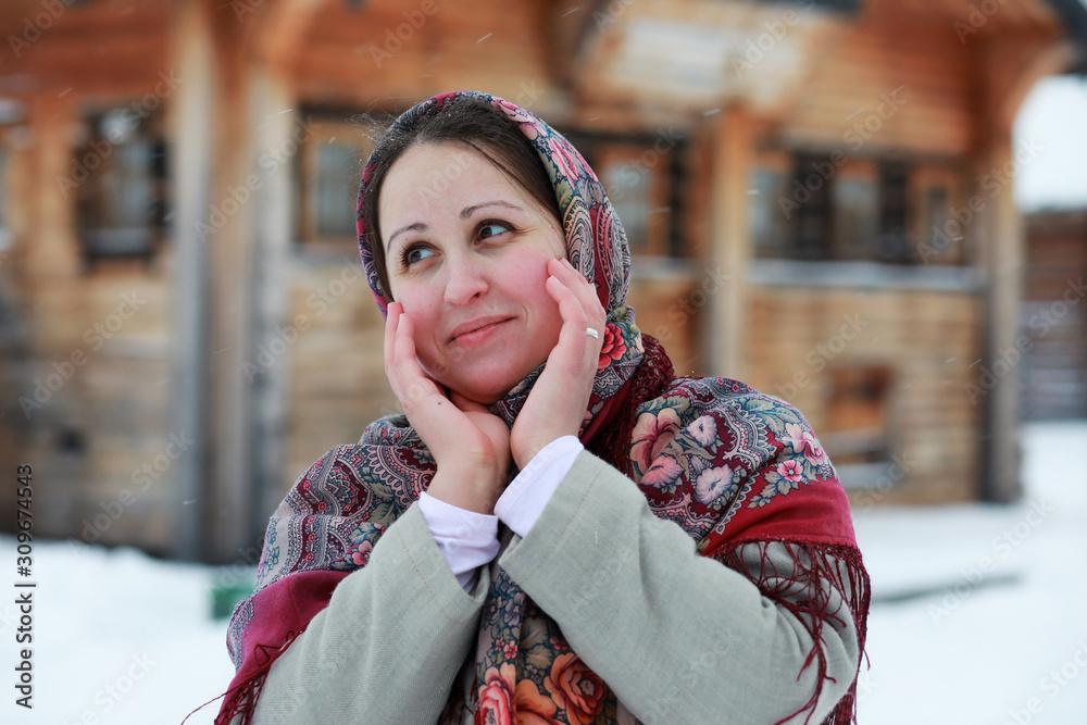 Fototapeta premium young girls in traditional costumes of the Russian north in winter